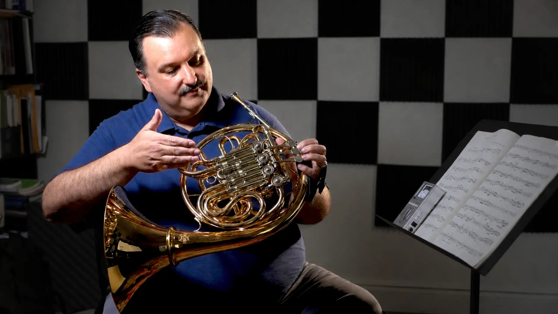 French horn instructor Jonathan Snyder demonstrating horn technique